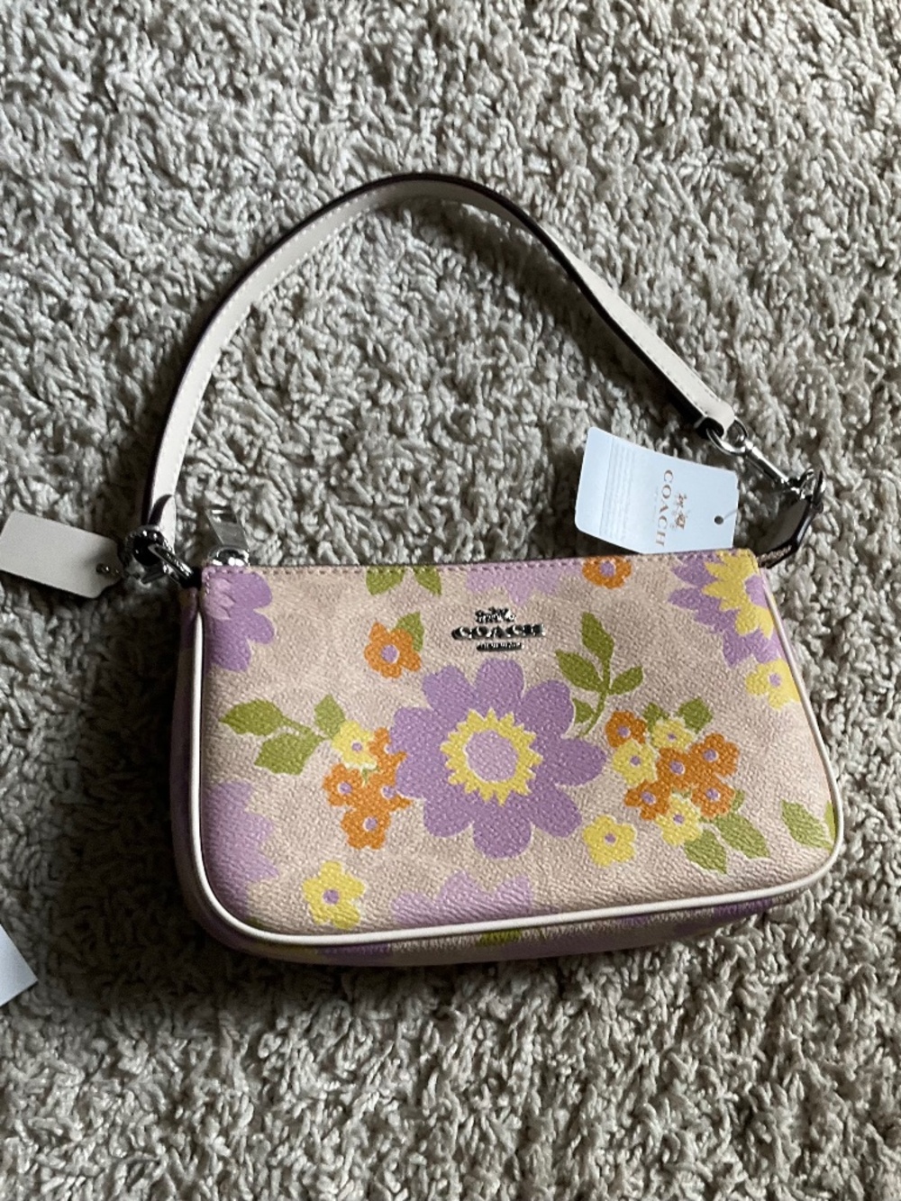 COACH NOLITA 19 IN SIGNATURE CANVAS WITH FLORAL PRINT. SILVER/SAND. ITEM # CBM73